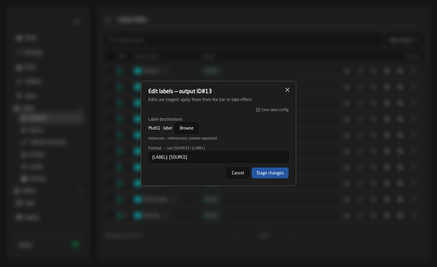 The Edit labels dialog for an output, showing a Multiviewer label destination and the format {LABEL}: {SOURCE}